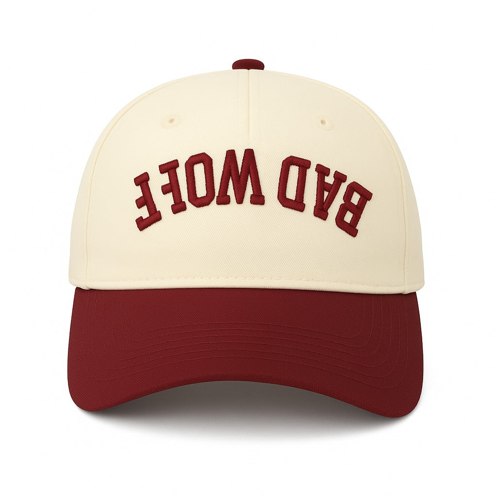 Gorra REVERSE BADWOLF  Guinda